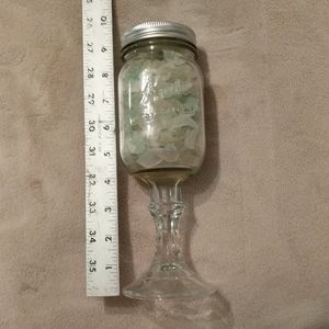 Redneck wine glass filled with seaglass